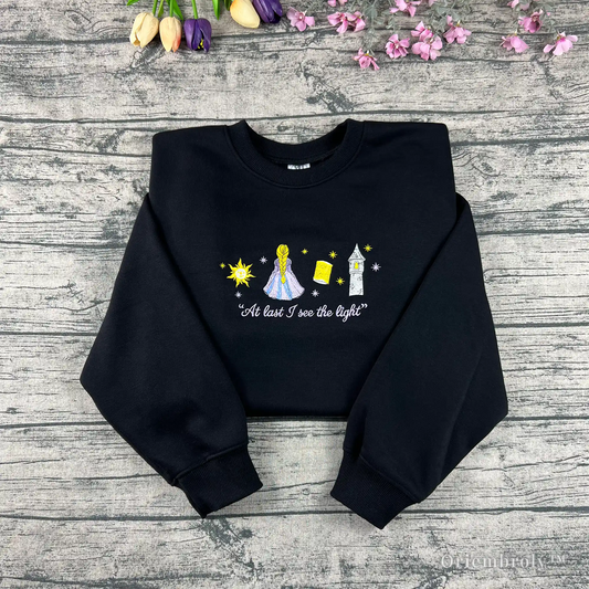 At last I see the light embroidered crewneck with lantern festival design