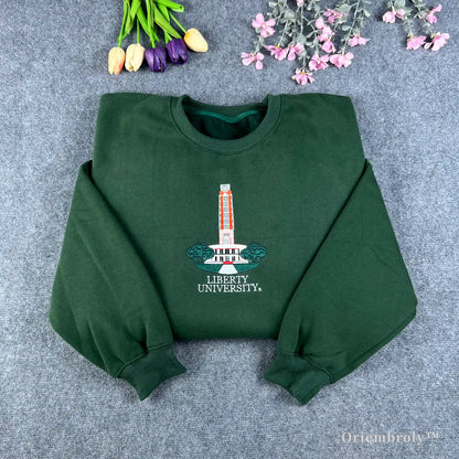 Forest green Auburn University sweatshirt featuring Samford Hall clock tower embroidery