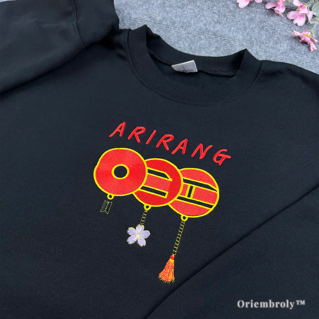 High-quality Bangtan Sonyeondan (BTS) merch: black crewneck with red embroidered symbols