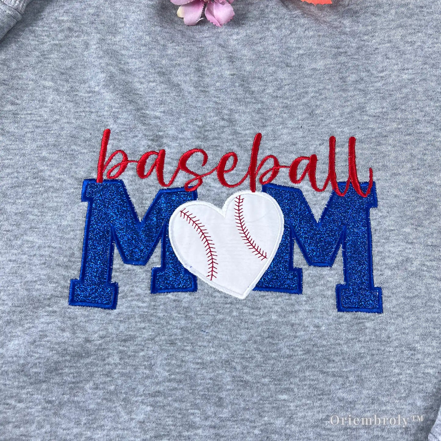 close up white heart with red baseball stitching embroidery