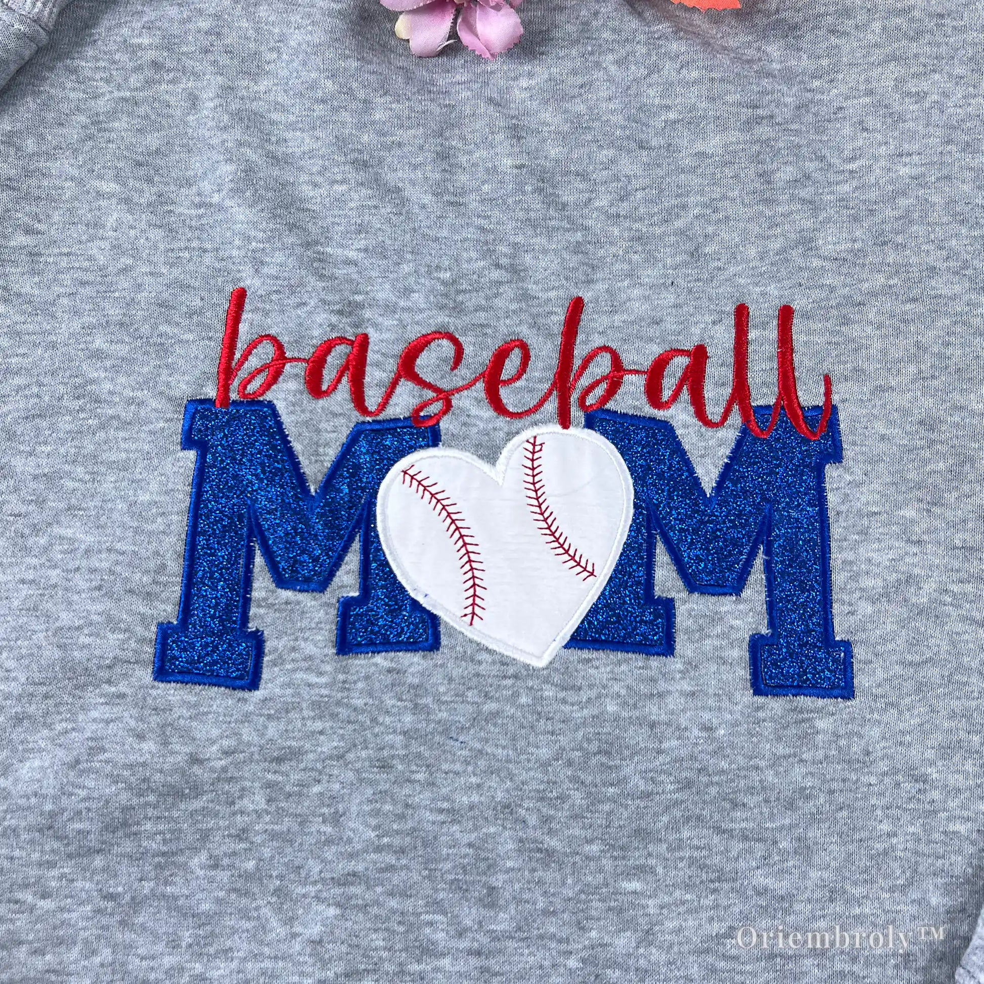 close up white heart with red baseball stitching embroidery