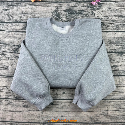 Esthetician embroidered gray sweatshirt