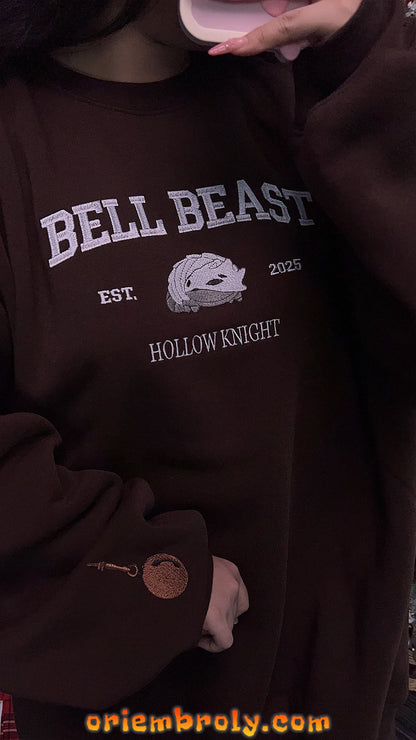 White and light gray Knight mask embroidery detail