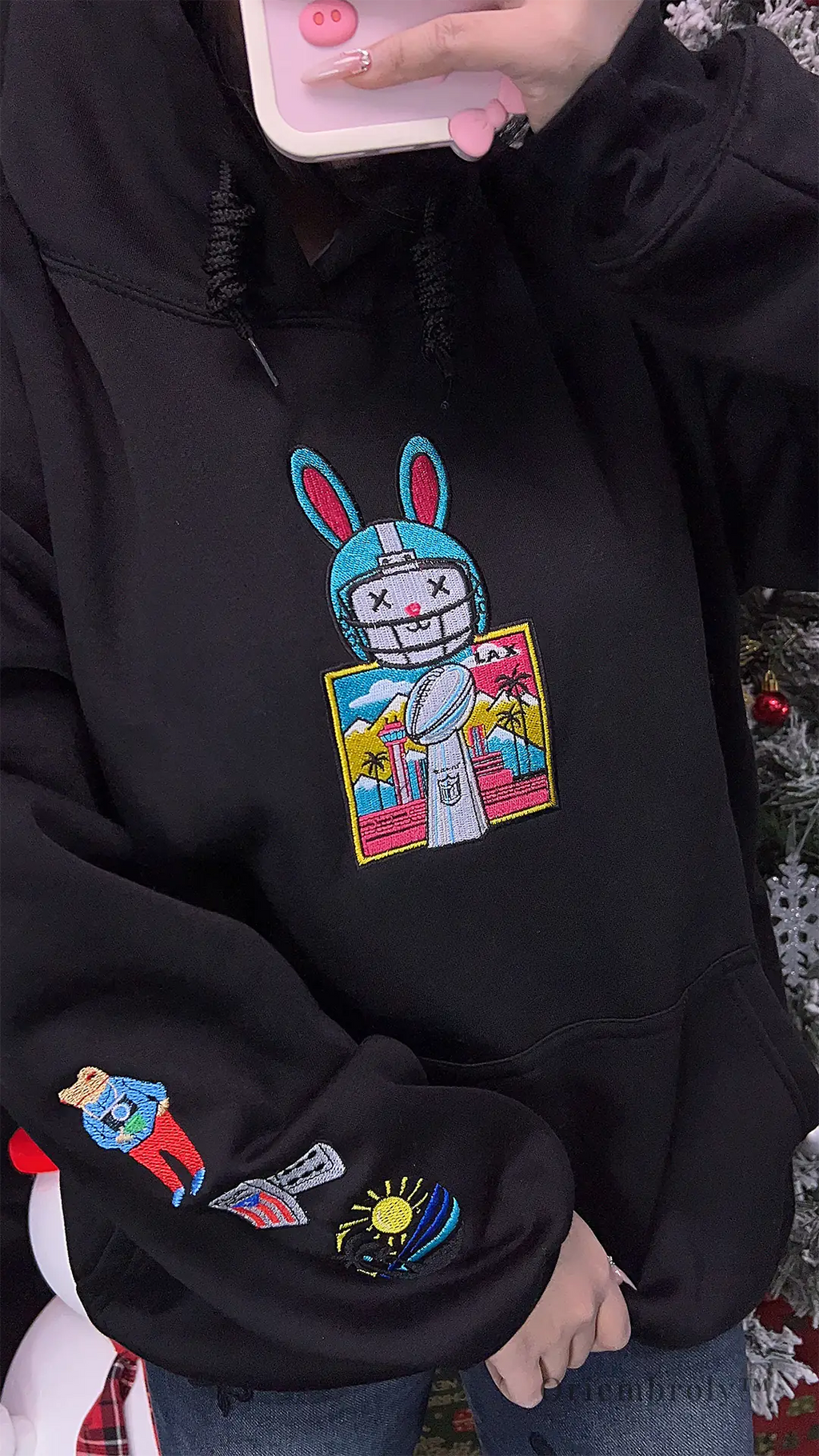Black Latin sports-inspired embroidered hoodie sweatshirt Model
