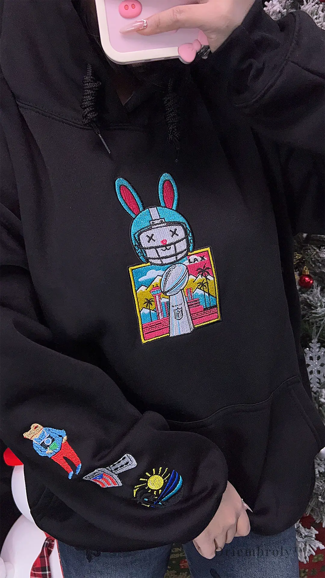 Black Latin sports-inspired embroidered hoodie sweatshirt Model