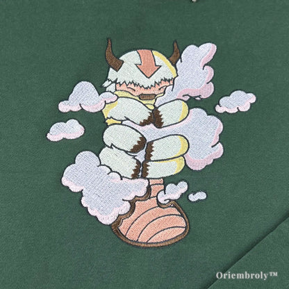 close up flying bison cloud embroidery satin stitch detail