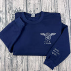 A Warner sweatshirt inspired by the Shatter Me series, custom embroidery for book lover apparel fans.