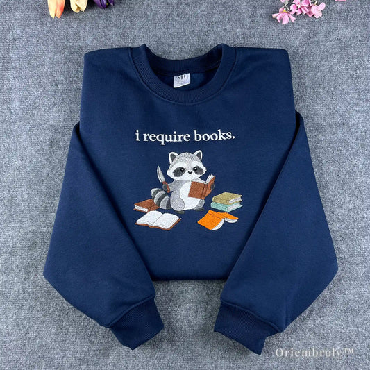 funny raccoon book lover sweatshirt embroidered crewneck