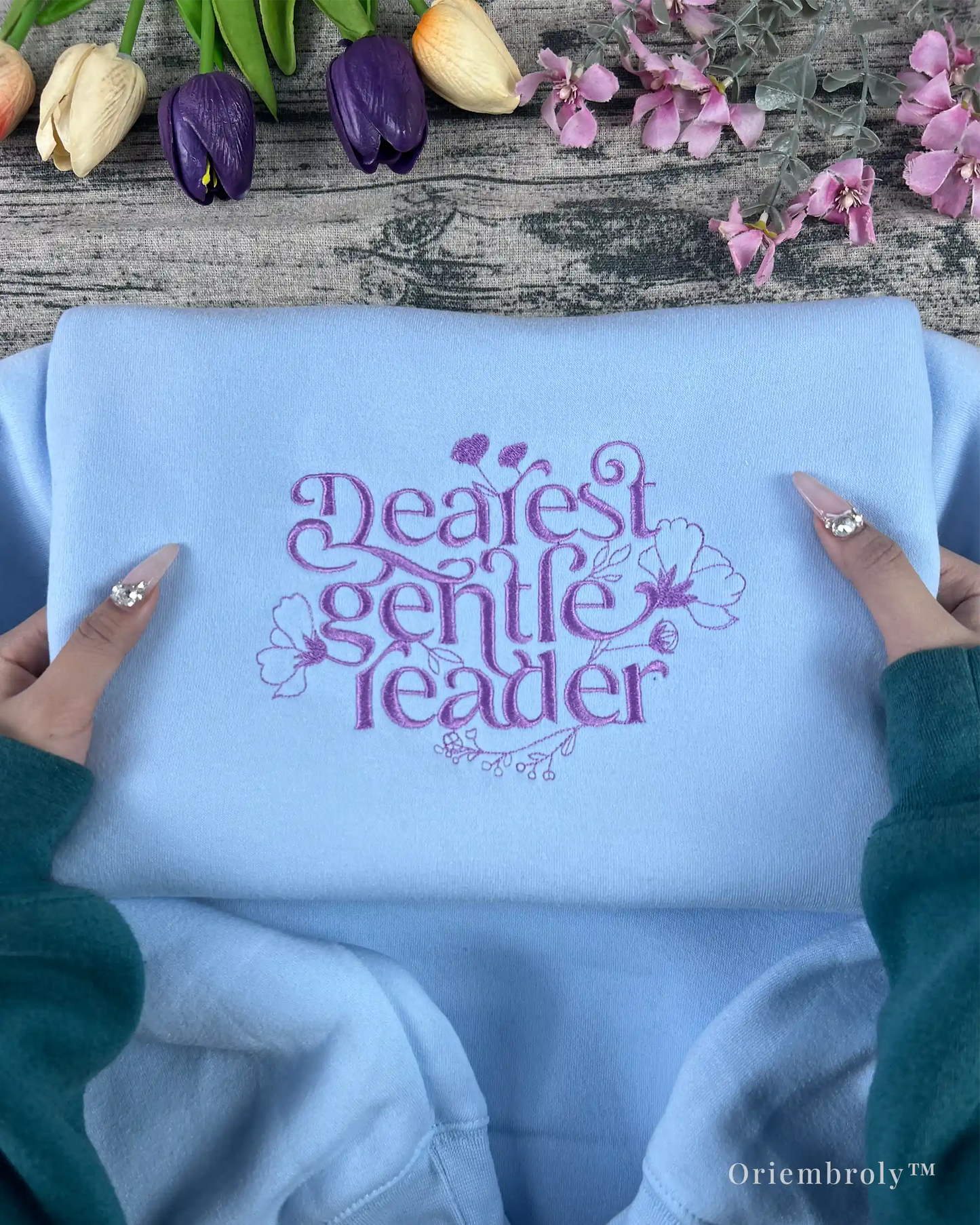 purple thread embroidery texture on literary sweatshirt