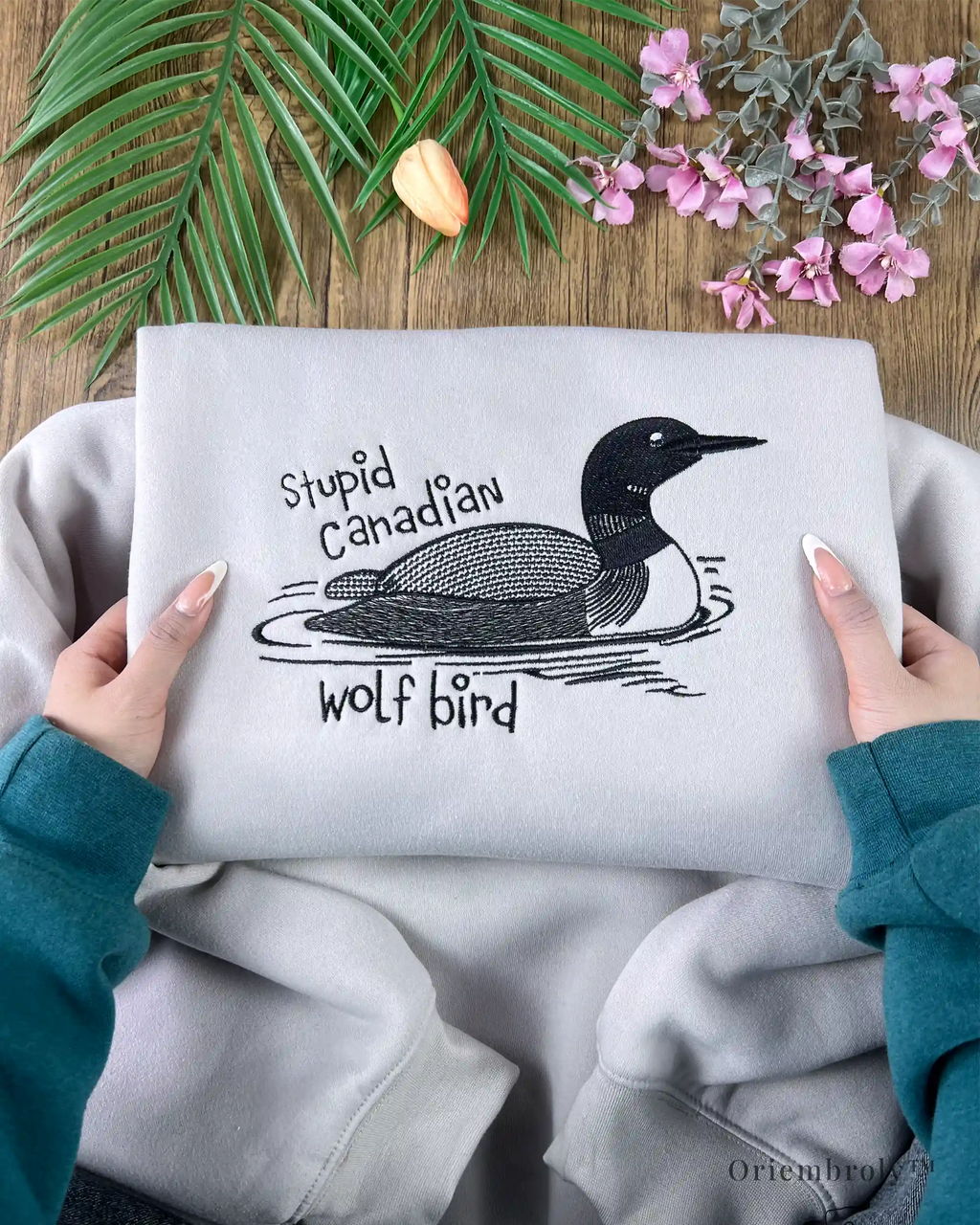Cozy embroidered crewneck sweatshirt with loon artwork