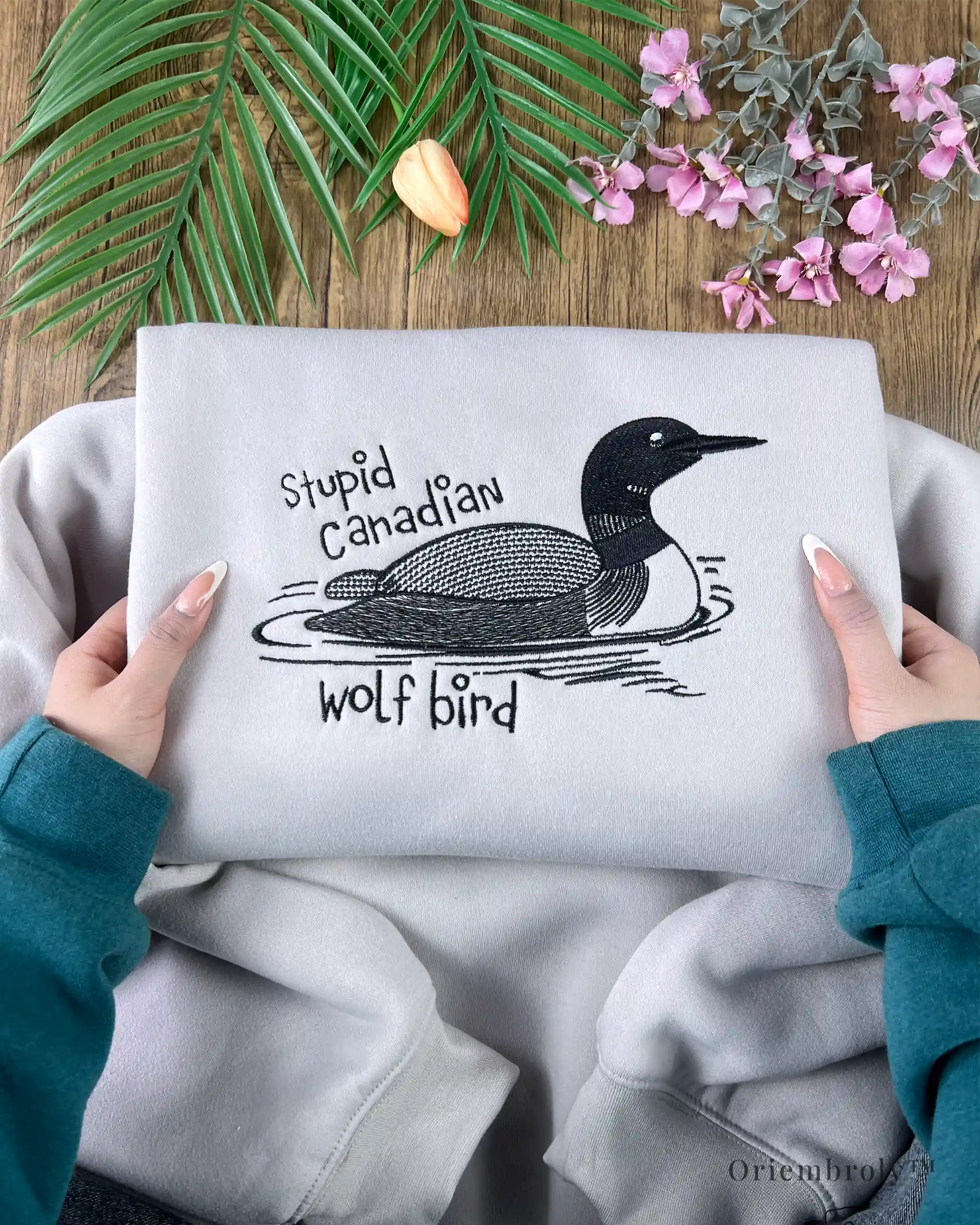 Cozy embroidered crewneck sweatshirt with loon artwork