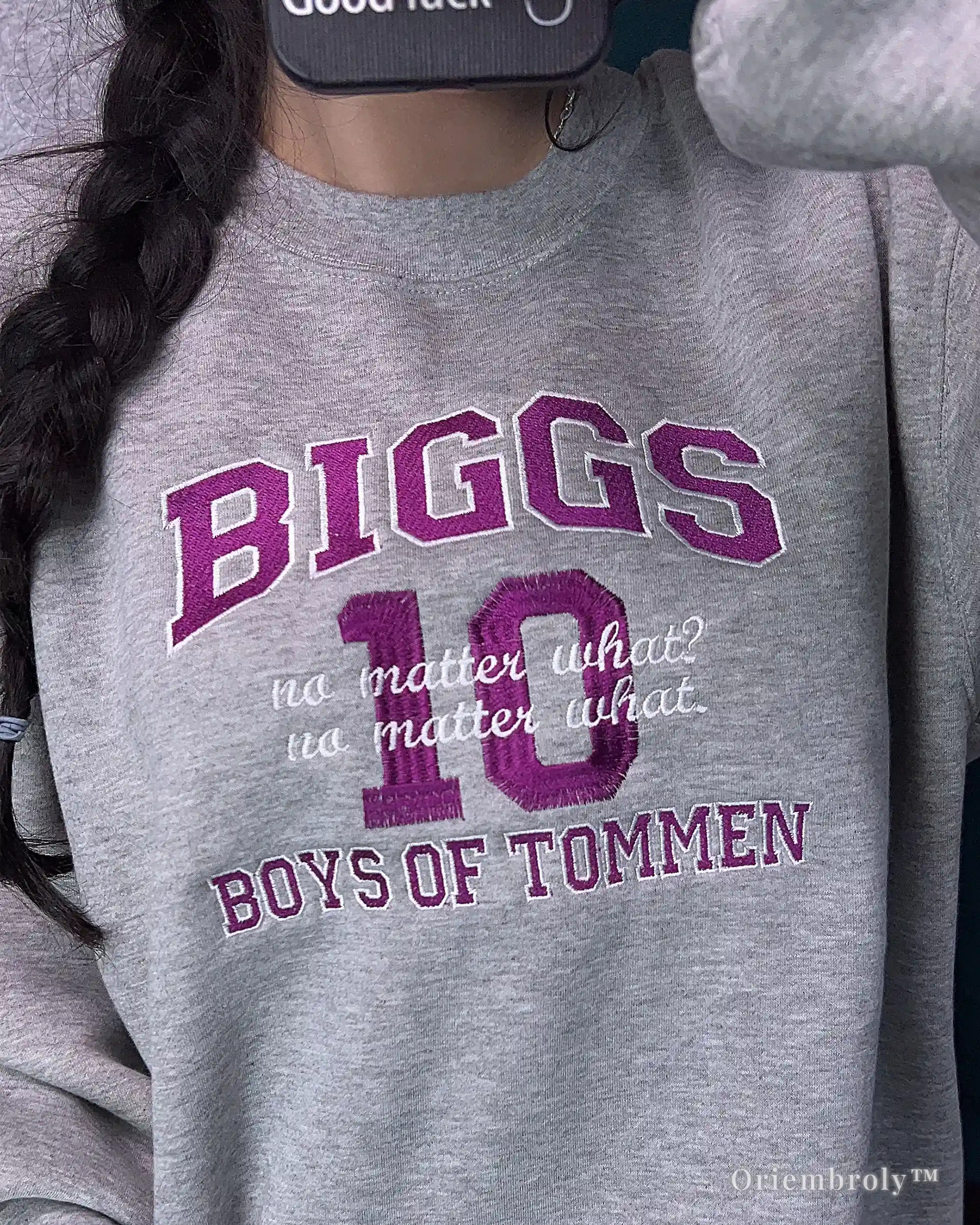 model wearing boys of tommen varsity embroidered sweatshirt