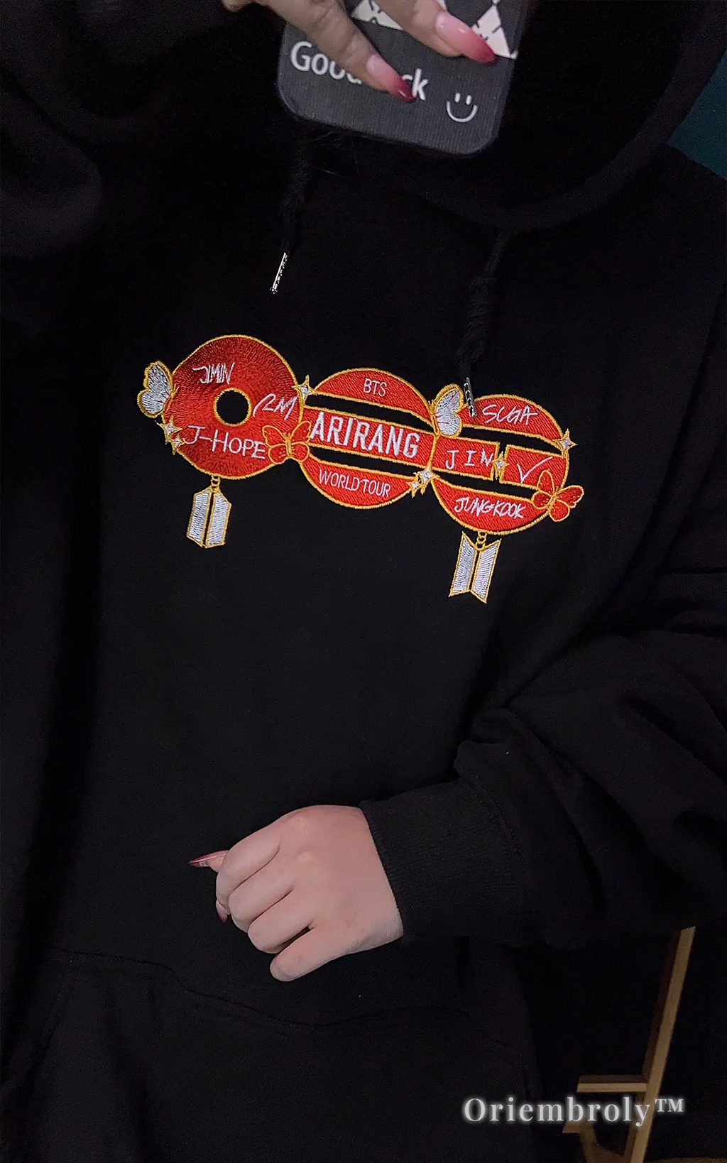 Perfect BTS concert outfit: Embroidered black sweater with red Bangtan logos