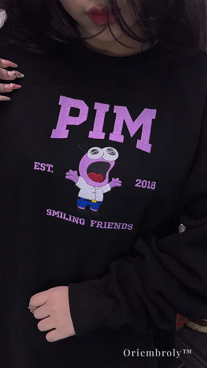embroidered cartoon sweatshirt worn casually