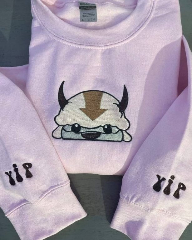 Cute chibi Appa sky bison with Yip Yip sleeves anime embroidered vintage crewneck sweatshirt in light pink
