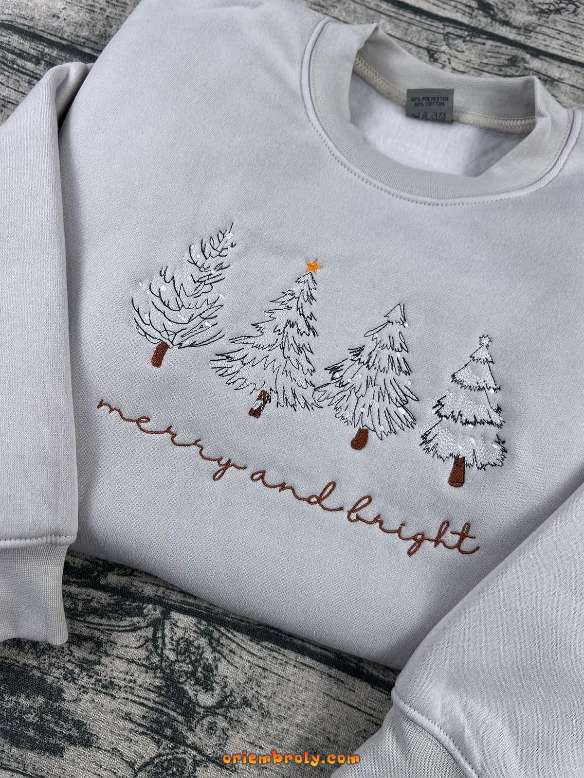 Holiday crewneck with stitched Christmas tree design