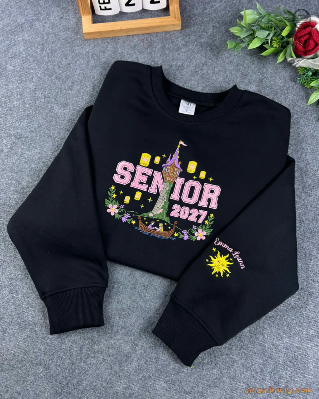 Black Class of 2027 crewneck sweatshirt embroidered with Tangled castle tower design and custom sleeve sun detail