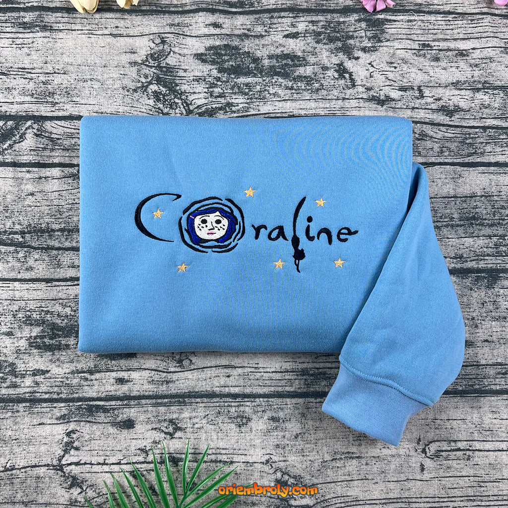Coraline sweatshirt with button eye embroidery