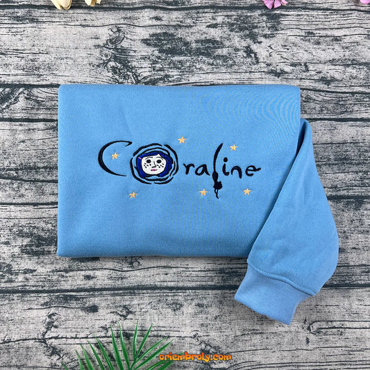 Coraline sweatshirt with button eye embroidery