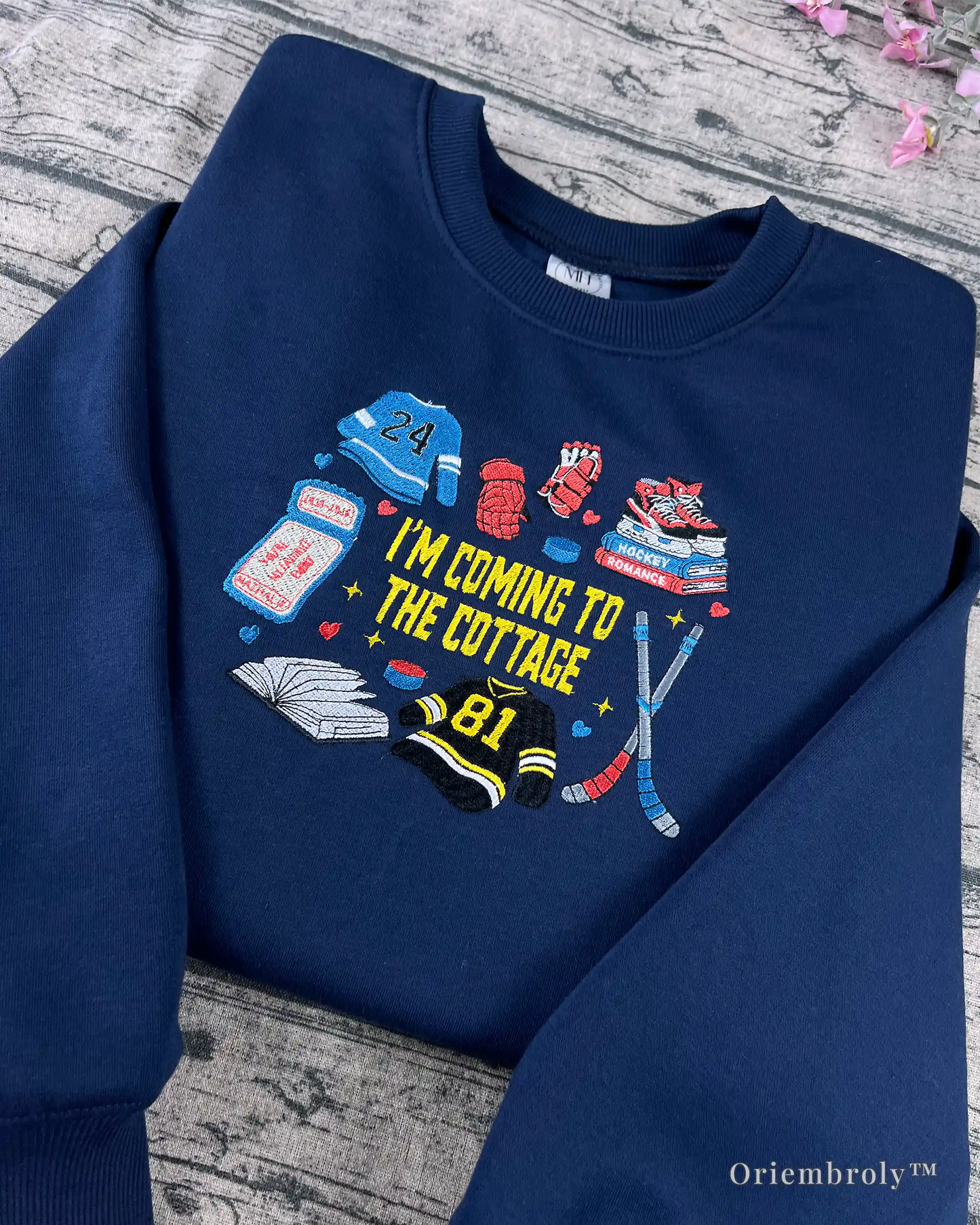 cottage phrase satin stitch embroidery on navy sweatshirt