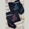 Cousins Beach embroidered sweatshirt with Team Conrad and seashell design