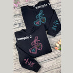Cousins Beach embroidered sweatshirt with Team Conrad and seashell design