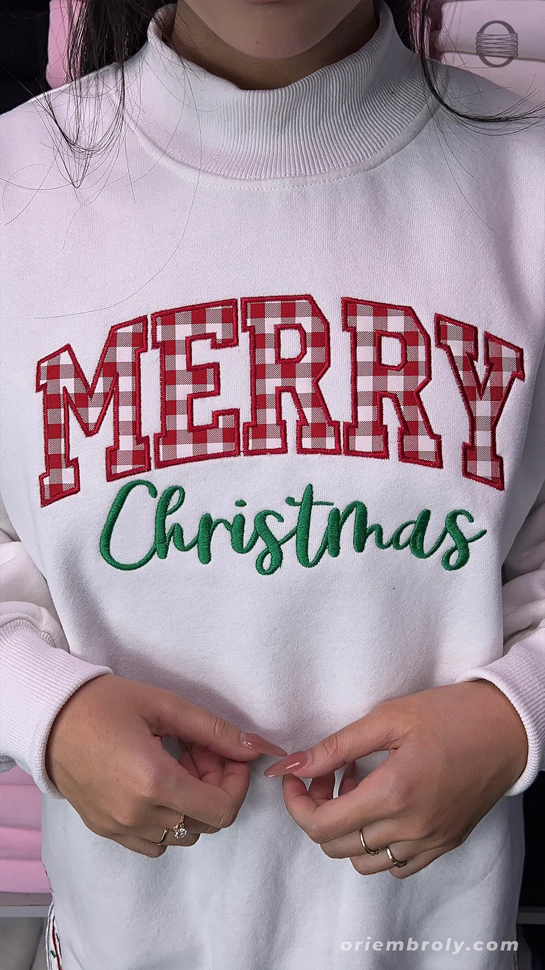 Model wearing a white Merry Christmas red plaid embroidered crewneck sweater