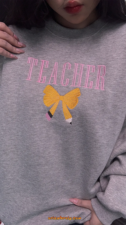 Teacher script embroidery on soft unisex crewneck