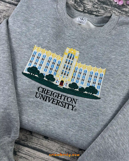 CU college sweatshirt with detailed building embroidery