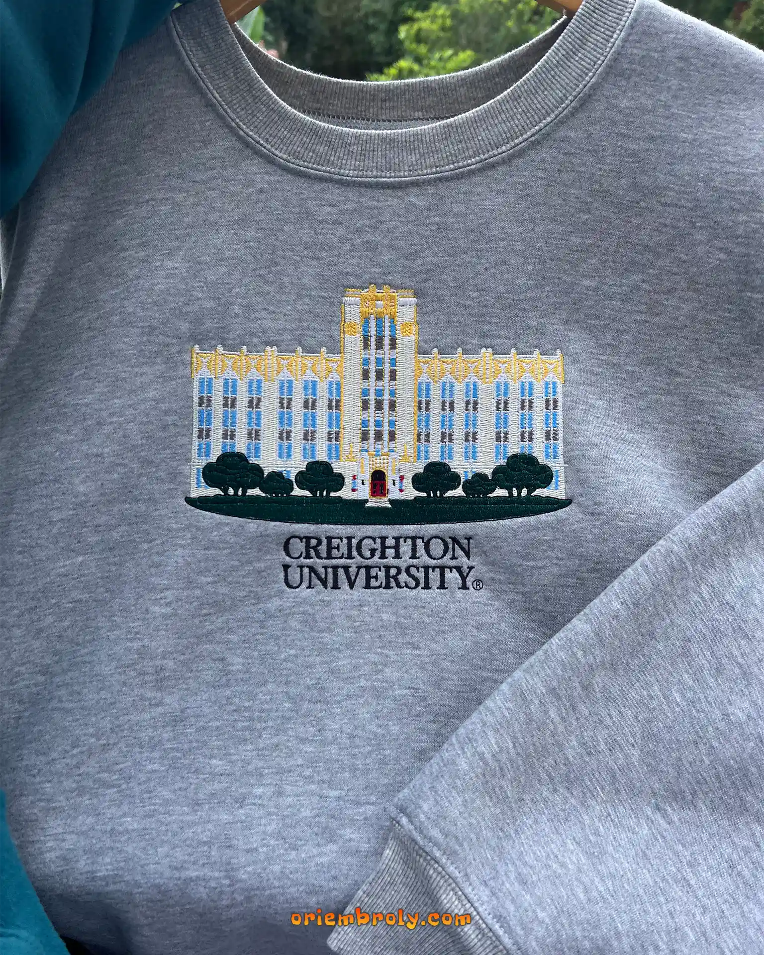 Blue and yellow Creighton embroidered sweatshirt