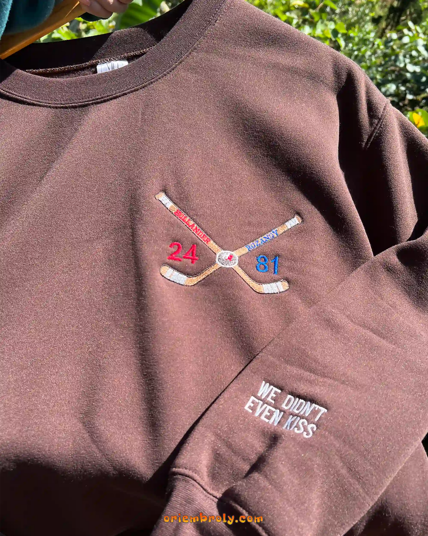 Textured hockey embroidery on crewneck sweatshirt