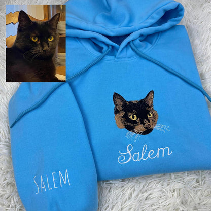 Personalized embroidered cat portrait sweatshirt featuring a custom feline design.