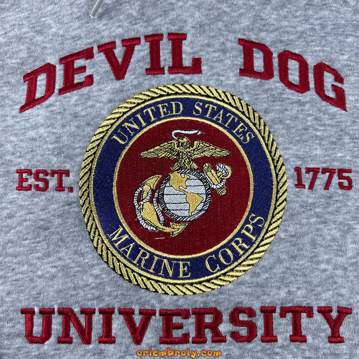 Gray sweatshirt with 'Devil Dog University' text and Marine Corps emblem.