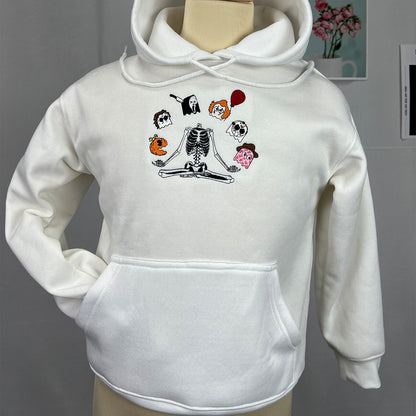 Custom embroidered Halloween gang owl sweatshirt in minimalist style