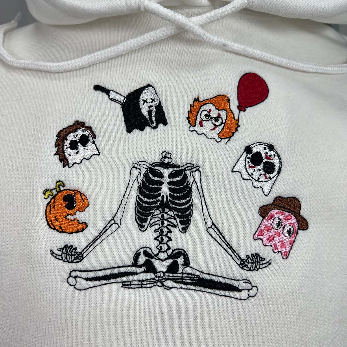 Custom embroidered Halloween gang owl sweatshirt in minimalist style