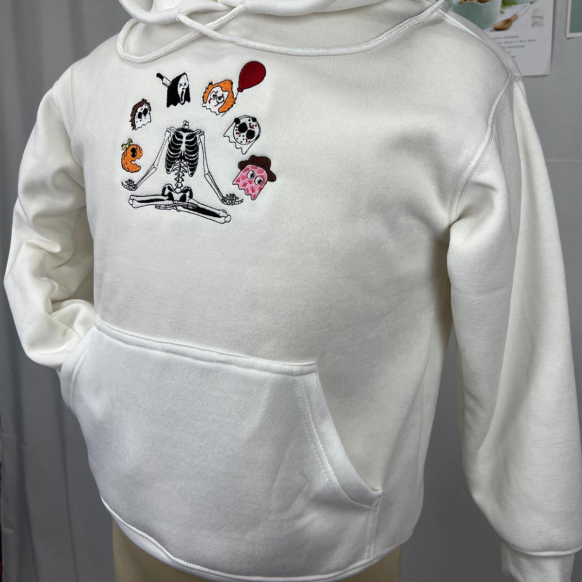 Custom embroidered Halloween gang owl sweatshirt in minimalist style