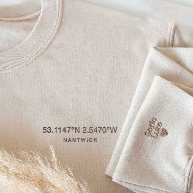 Custom embroidered hoodie with personalized coordinates from your address