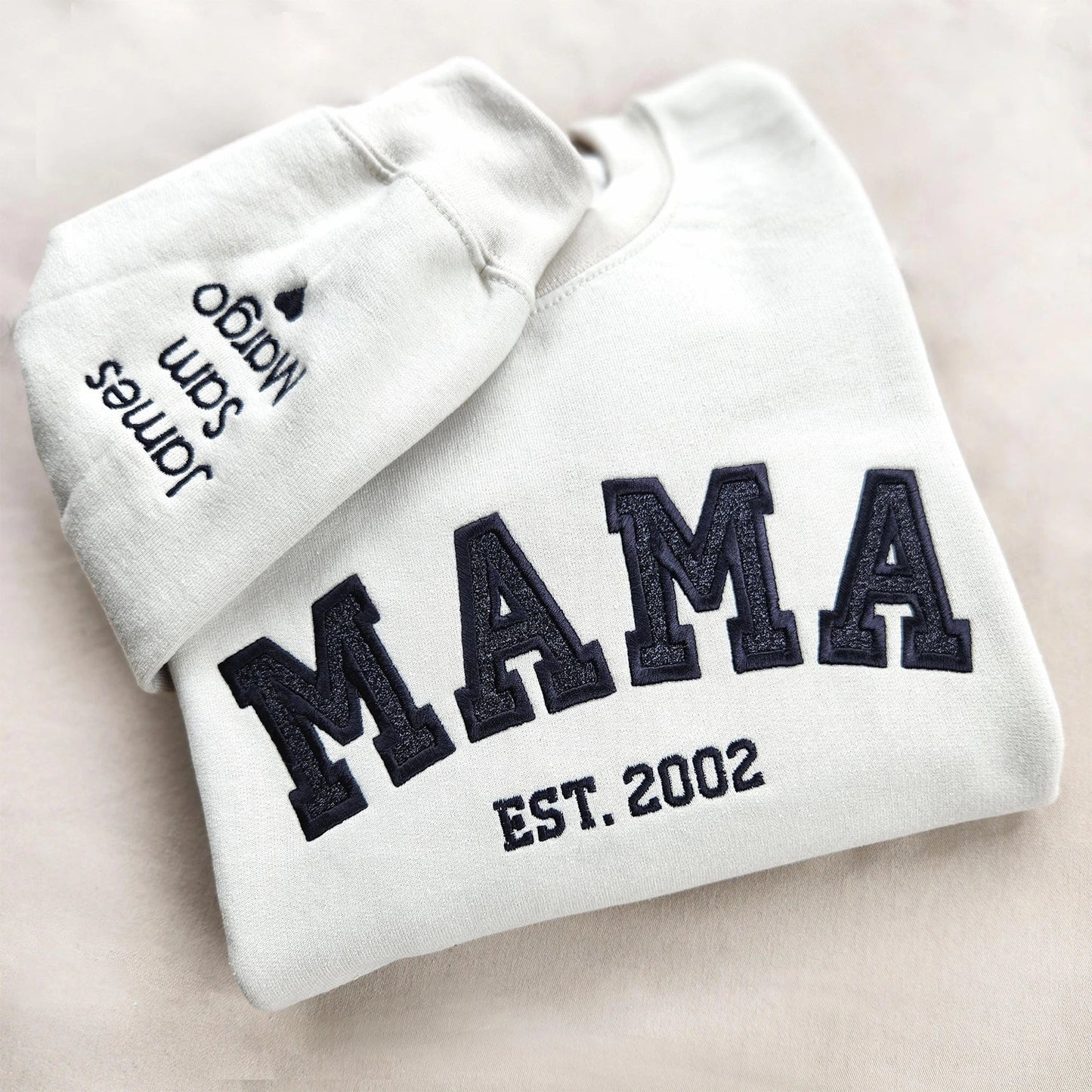 Custom embroidered sweatshirt for moms with kids' names on sleeve — personalized gift