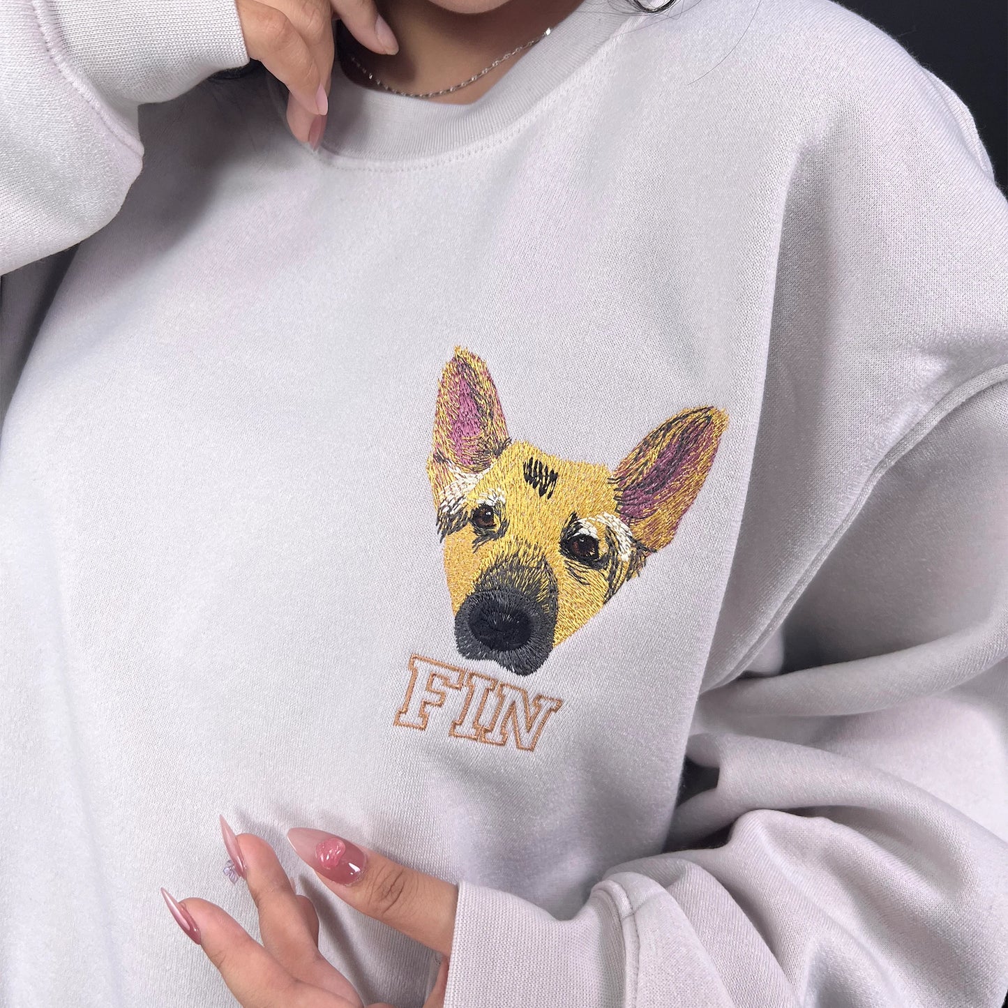 Personalized embroidered pet portrait hoodie featuring your dog or cat’s face.