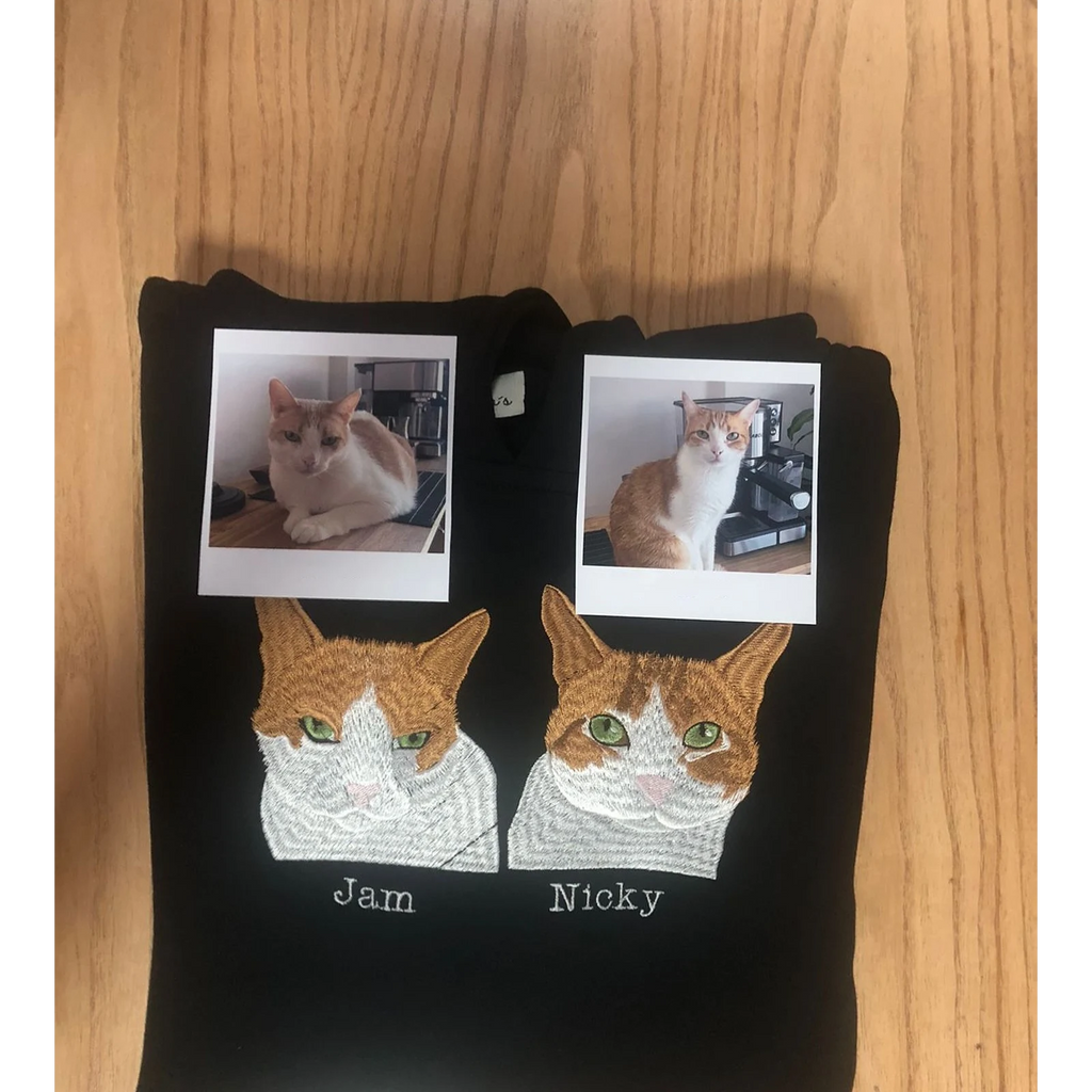 Custom embroidered pet sweatshirt with personalized cat face design