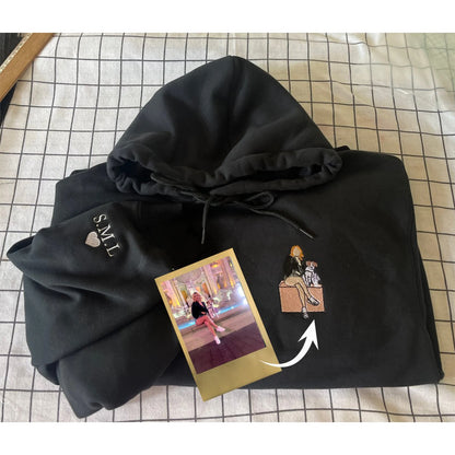 Personalized embroidered portrait hoodie with custom photo design.