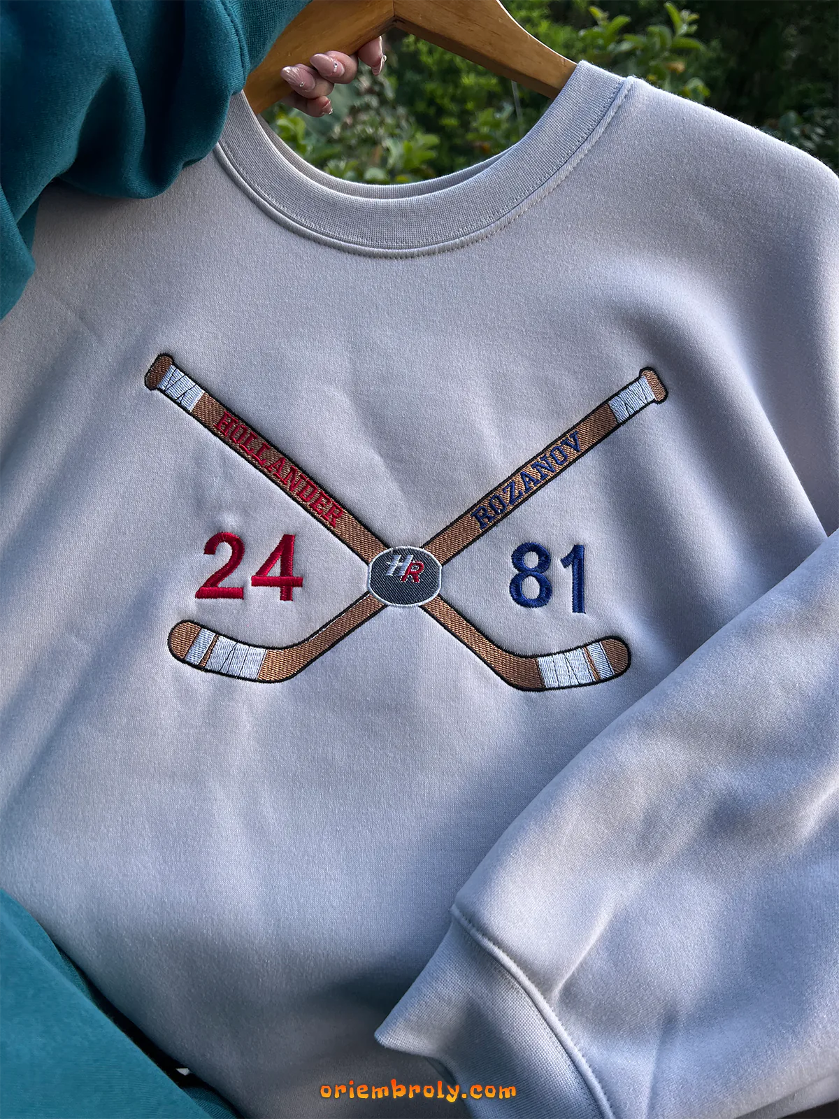 Hockey fan sweatshirt with player numbers 24 and 81
