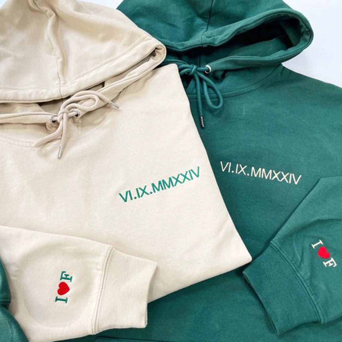 Custom embroidered hoodie with bold Roman numeral design.