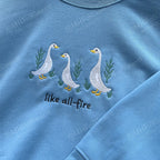 Goose sweatshirt with Sunrise on the Reaping quote