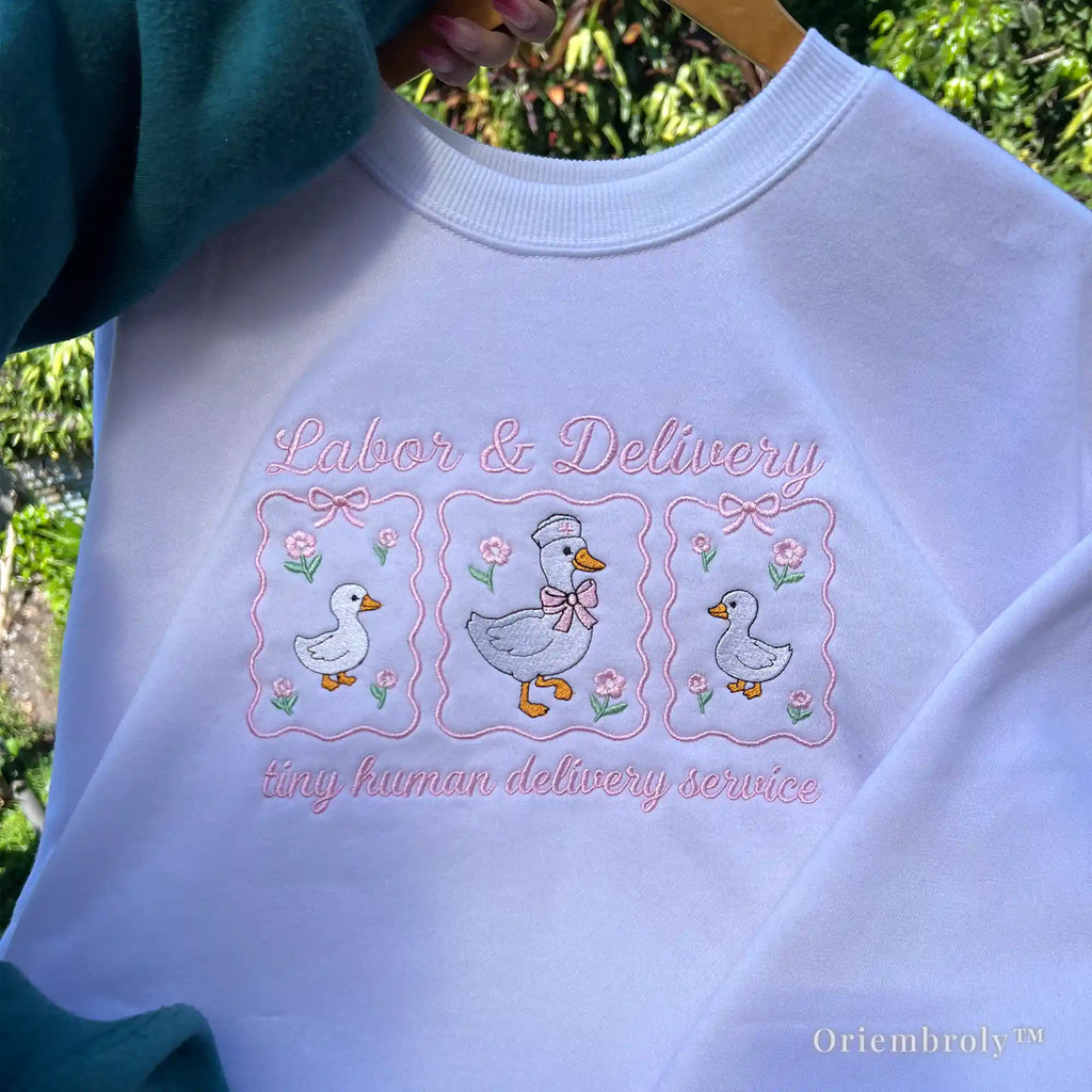 Cute obstetrics (OB) nurse embroidered crewneck with minimalist pink bow and goose design