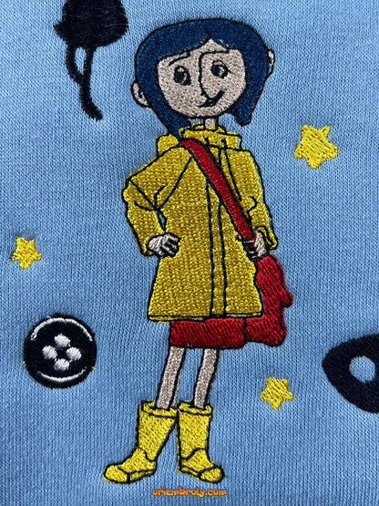 Cozy Coraline button eye pullover
