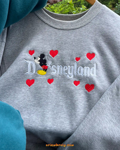 Matching Mickey and Minnie sweatshirts for couples inspired by Disneyland style
