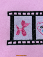 Gossip Girl film strip graphic embroidered top