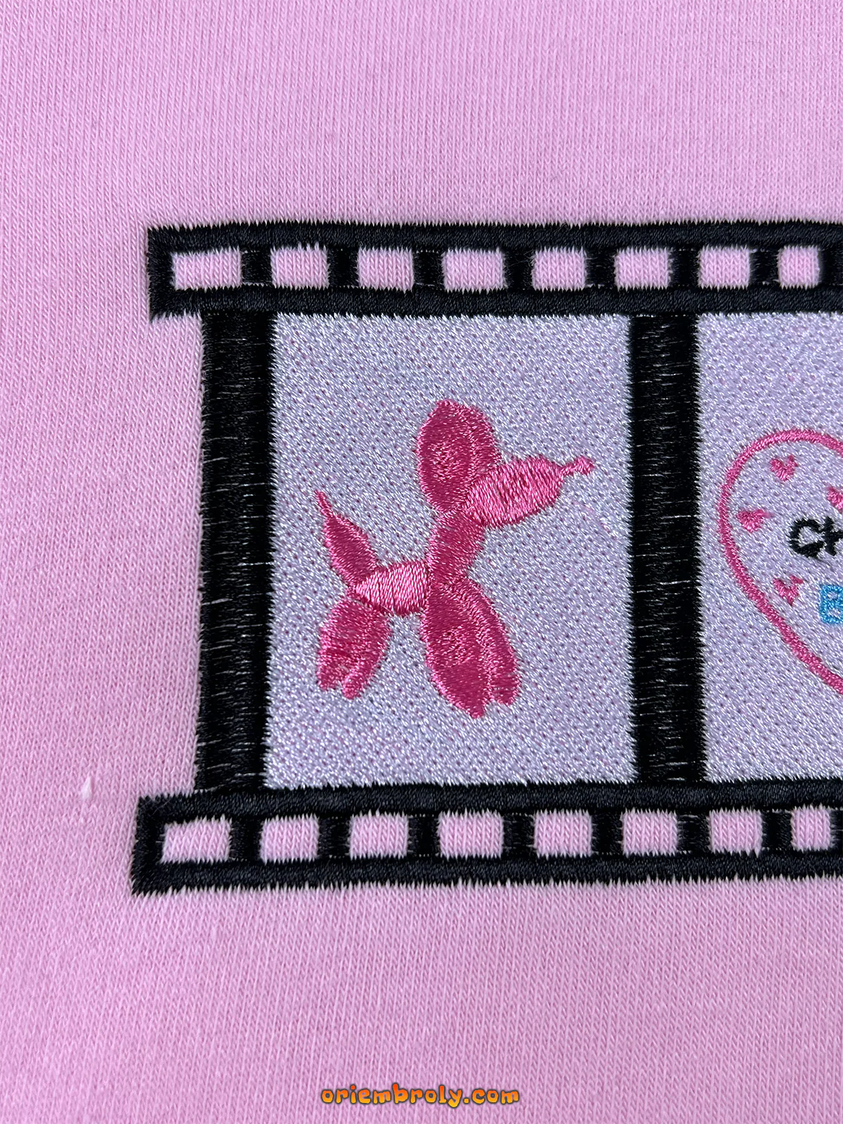 Gossip Girl film strip graphic embroidered top