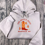 Done and Dusted sweatshirt featuring licensed Lyla Sage cowboy romance book merch embroidery.